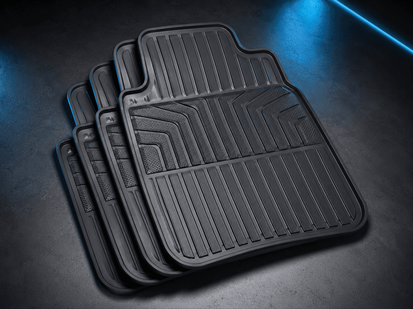 All-Weather Floor Defense universal cabin accessory kit arranged in a graphite studio